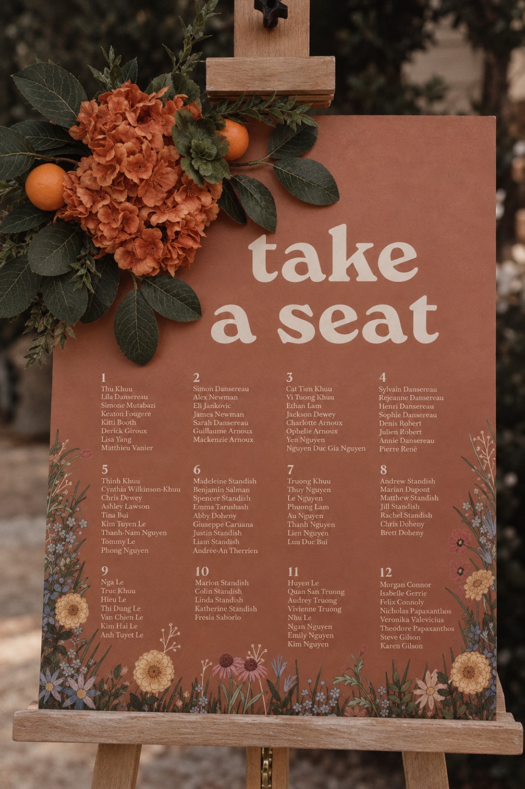The terracotta seating chart at Thu and Simon's wedding in Rougemont, Quebec