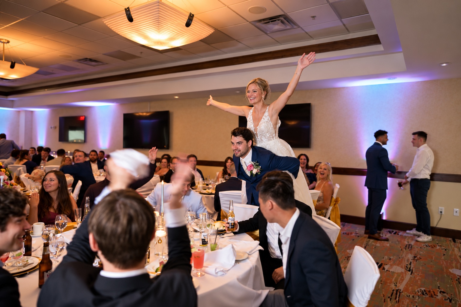 Vincent carries Jaci through the reception in Watertown, Upstate New York