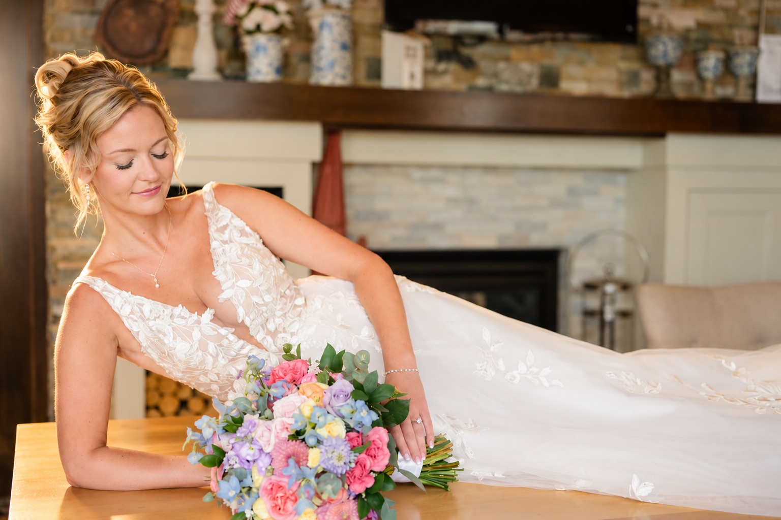 Jaci looking down at her bouquet in Watertown, Upstate New York