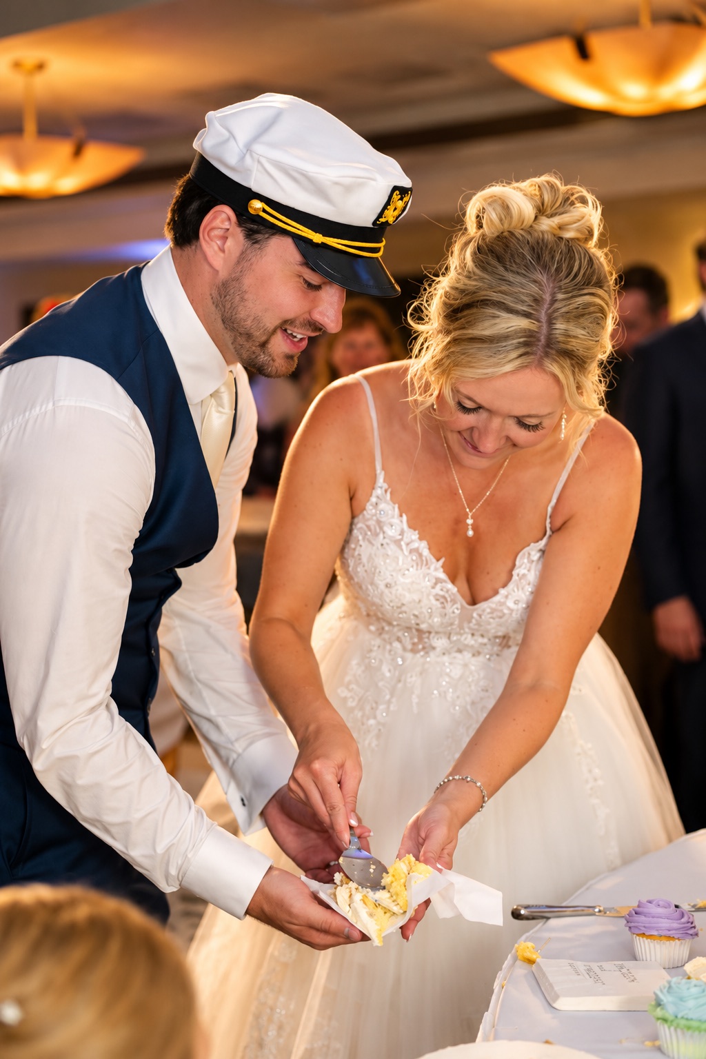 Jaci and Vincent cut the cake in Watertown, Upstate New York