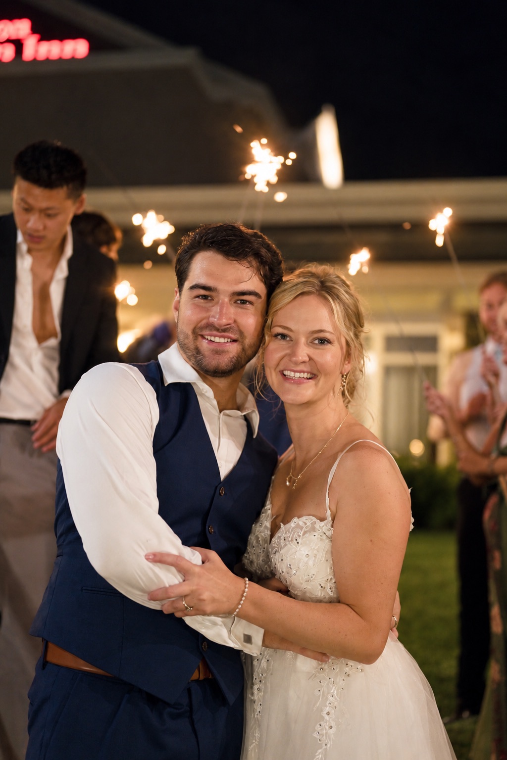 Jaci and Vincent beneath sparklers in Watertown, Upstate New York
