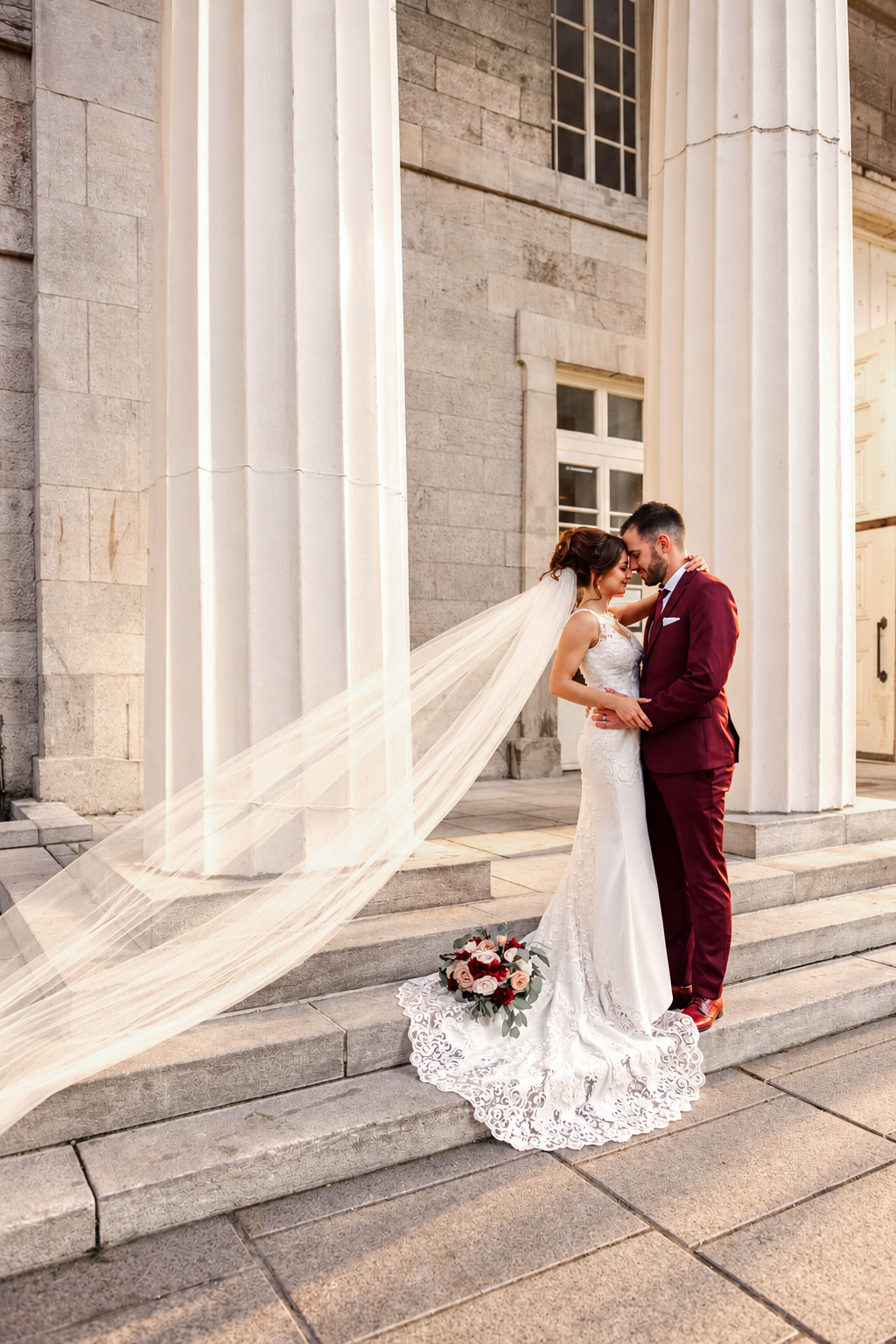 Kristine and Kenneth at Marché Bonsecours with her veil on the steps
