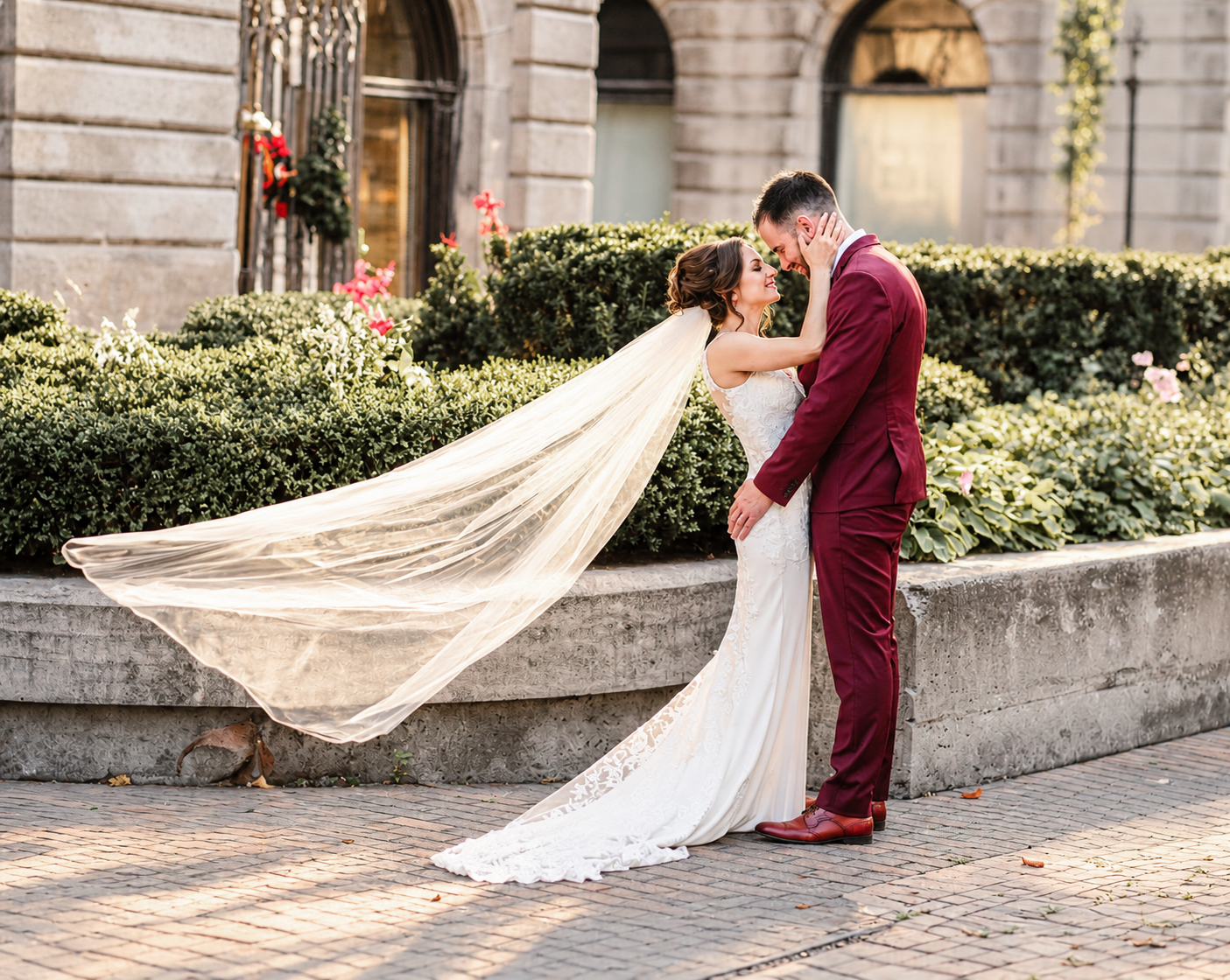 Kristine and Kenneth on Old Montreal cobblestones with a long veil