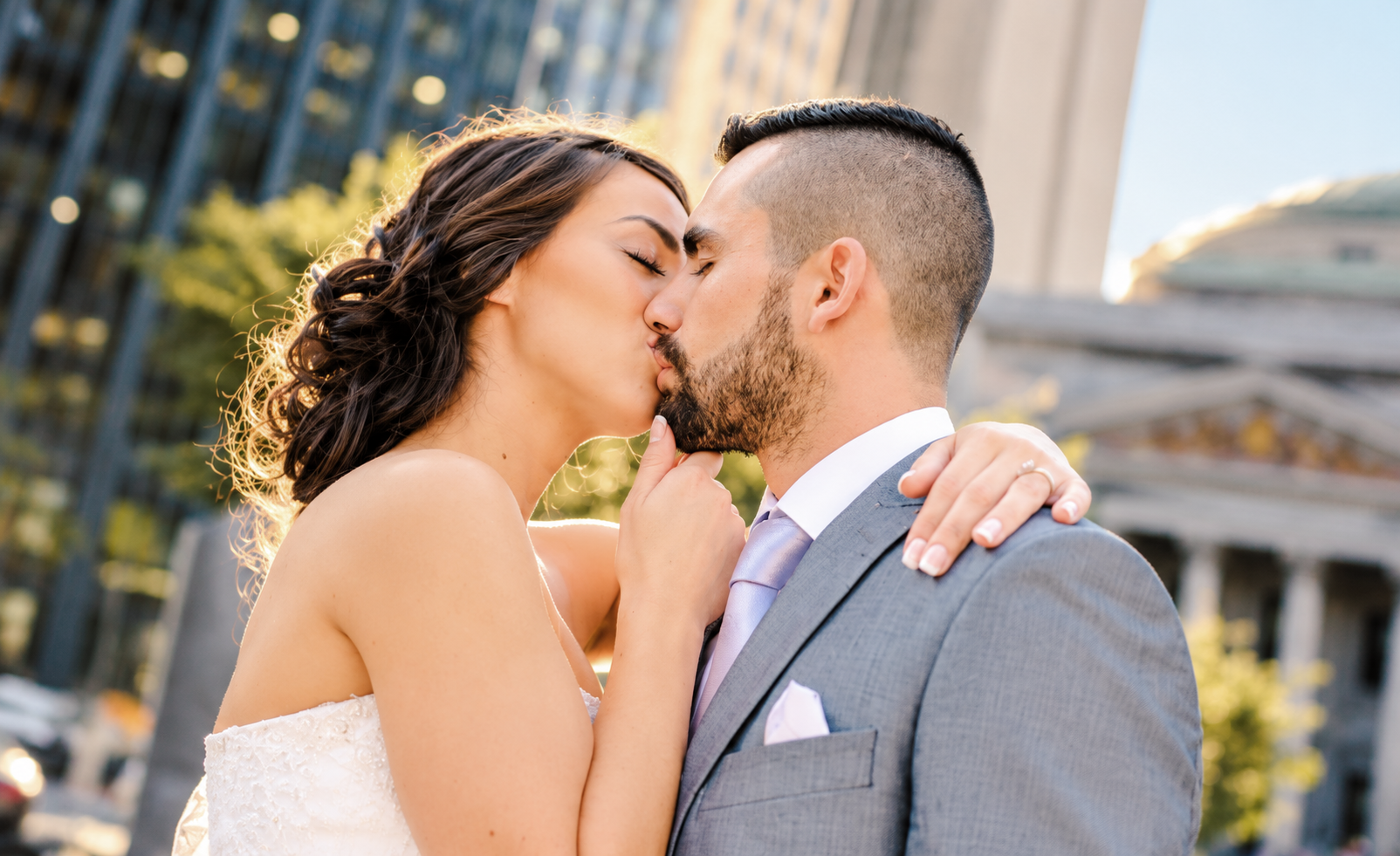 Sara and Kevin kissing downtown